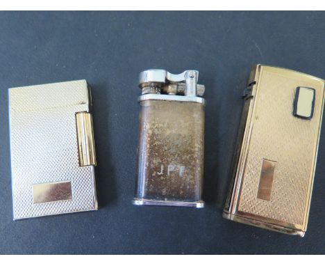 A sterling silver cigarette lighter and two Ronsons - not tested