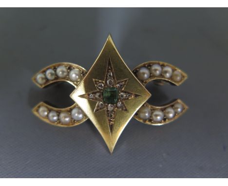 An unmarked gold, pearl and emerald brooch of diamond and horseshoe form - Weight approx. 9.8gmsCondition report: In clean an