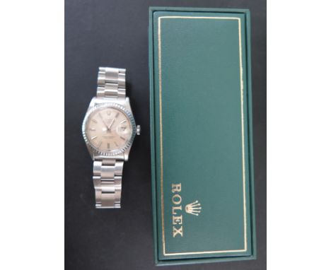 A Rolex Oyster Perpetual Datejust wristwatch, stainless steel case and strap - first purchase 1972 with all original papers, 