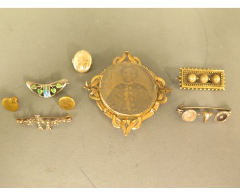 Four bar brooches including a silver and enamel Art Nouveau design brooch one tested 18ct gold brooch - Weight approx. 5.8 gm