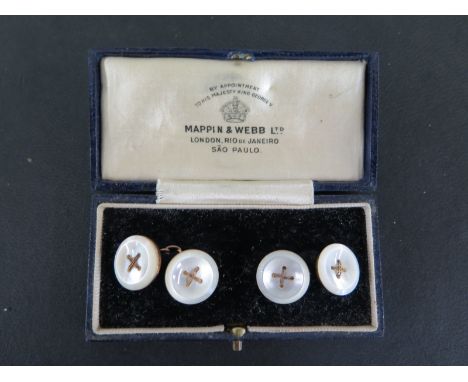 A pair of 9ct gold and mother of pearl button cufflink's in a Mappin and Webb box