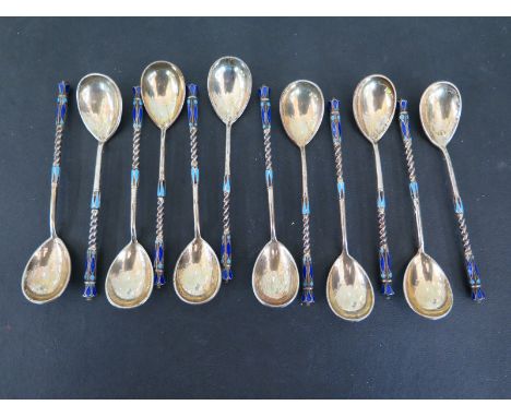 A set of 12 Russian enamel decorated and silver gilt spoons - Length 10.5cm long - approx weight 5 troy oz