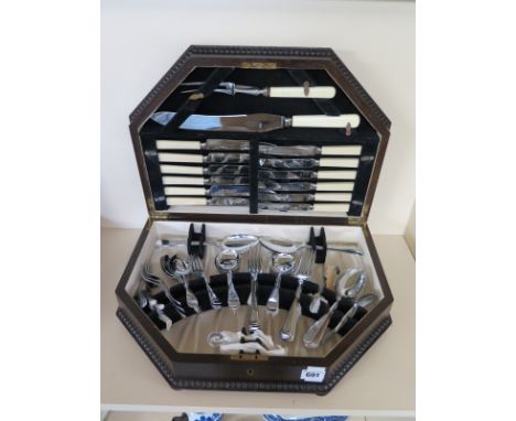 A canteen of cutlery, circa 1920's - 56 pieces, 6 place setting, including  six egg spoons, two tiny condiment spoons, 4 serv