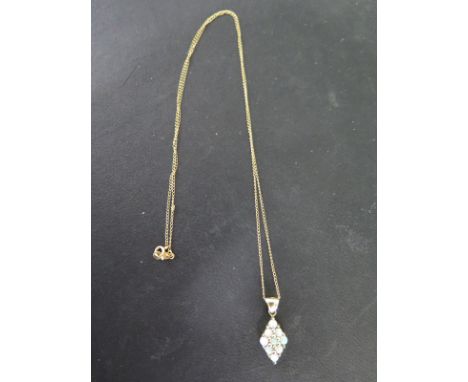 A 9ct yellow gold opal pendant and chain - Length 46cm - Weight approx. 2.7gms Condition report: Clean condition 