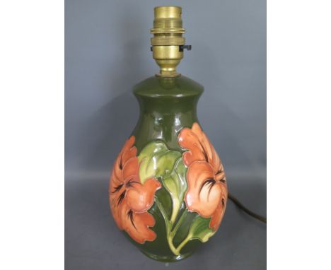 A Moorcroft Hibiscus pattern table lamp, no shade - Height 26cm  including fittingsCondition report: Minor surface scuffs oth