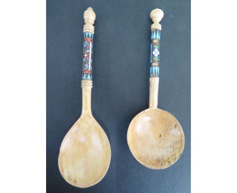 Two Russian treen spoons with enamel handles - Lengths 18cm and 16cm - both reasonably good