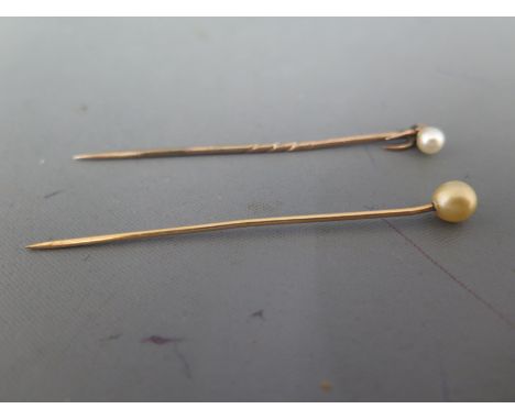 Two stick pins both with pearls to top both unmarked Condition report: Both in good condition 