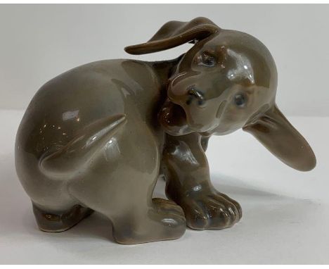 A Royal Copenhagen model of a puppy 