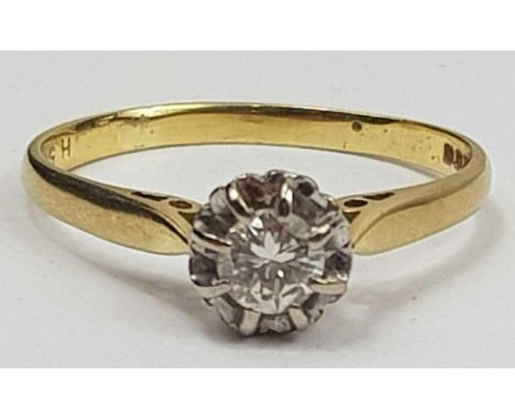 An 18ct gold single stone ring, the diamond in an illusion setting and measuring approximately 4.5mm, finger size R, 2.82g gr