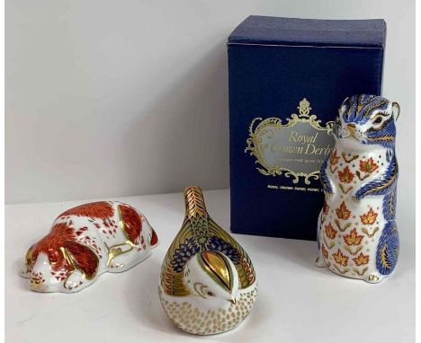 A Royal Crown Derby model of a chipmunk, along with a bird paperweight and dog