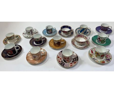 A collection of fourteen collectable Coalport coffee cups and saucers