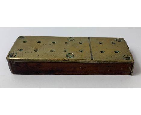 An early 20th century brass and oak cribbage board, 14cm x 5cm 