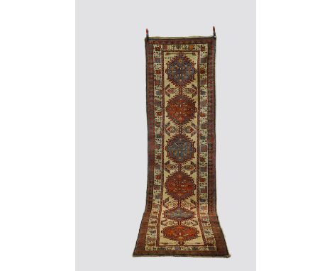 Sarab runner, north west Persia, dated 1344 (AH) [1925 AD] 12ft. 1in. X 3ft. 4in. 3.68m. X 1.02m. Slight wear in places. Ligh