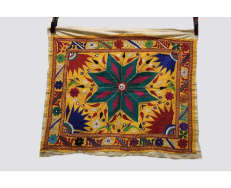 Three Indian textiles, all mid-20th century, the first: a woven wool shawl, Assam, north east India,  64in. X 40in. 1.63m. X 