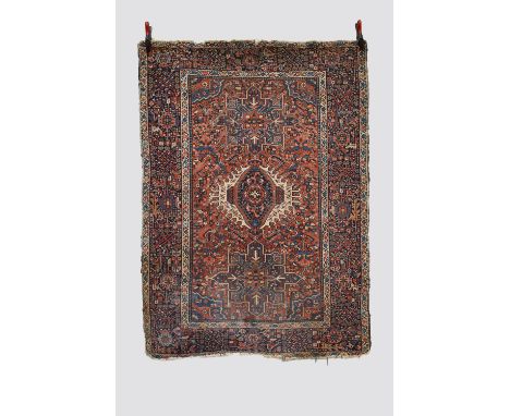 Three Karaja rugs, north west Persia, circa 1930s-40s, the first 6ft. 4in. X 3ft. 6in. 1.93m. X 1.07m. Light terracotta field