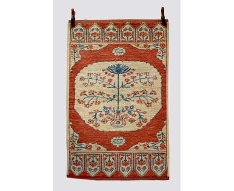 Rug of medallion design, last quarter 20th century, 5ft. 2in. X 3ft. 3in., 1.58m. X 1m.  Large ivory octagonal floral medalli