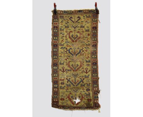 Unusual Konya rug, central Anatolia, probably first half 19th century, 5ft. X 2ft. 4in. 1.52m. X 0.71m. Overall wear, heavy i