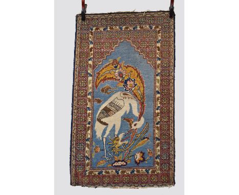 Pictorial Tabriz prayer rug, north west Persia, circa 1930s-40s, 4ft. 6in. X 2ft. 8in. 1.37m. X 0.81m. Slight wer in places; 
