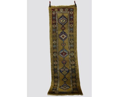 Sarab runner, north west Persia, circa 1920s-30s, 9ft. 9in. X 3ft. 2.97m. X 0.91m. Overall wear; small areas of repiling; 'bi