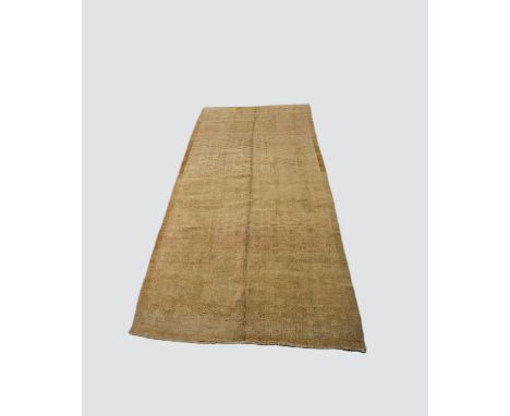 Anatolian Kars carpet of minimalist design, second half 20th century, 13ft. 1in. X 5ft. 6in. 3.99m. X 1.68m. Light walnut bro