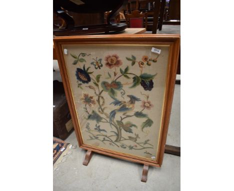 A traditional embroidered fire screen