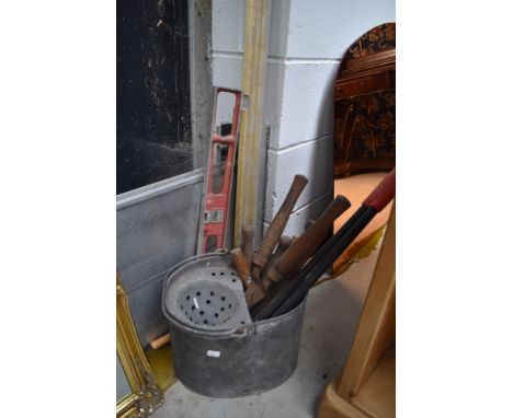 A selection of tools, mop bucket etc