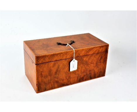 19th century mahogany cross banded tea caddy, the hinged lid enclosing an interior with two lidded compartments and centred w