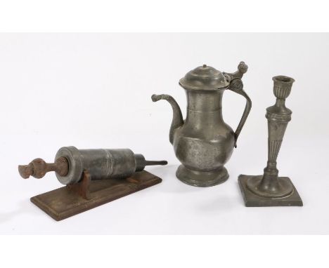 Pewter, to include a 19th Century coffee pot, a single candlestick and a 19th Century enema syringe, (3)