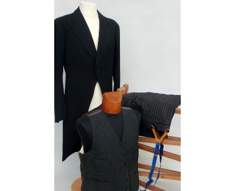 A 1937 tailcoat by Joseph K. Thompson in fair condition for vintage. A pair of pin stripe trousers, braces and two formal wai