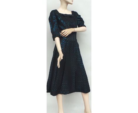 Five 50's/60's evening dresses. A black raglan sleeve and drop waist cocktail dress shot with turquoise and silver thread thr