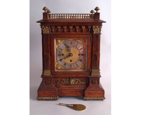 A late 19th century George III style gilt metal mounted quarter striking bracket clock, silvered dial with an 8 day movement,