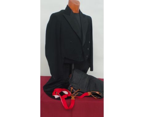 Two vintage tail suits dated 1936 and 1954 - tailored in Duke St. and George St. respectively. Pinstripe trousers with both a