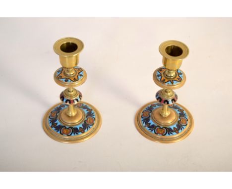 A pair of 19th century French dore champleve enamel candlesticks, in the Moroccan taste, 14cmH