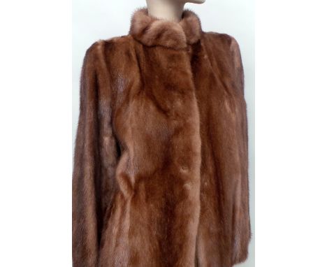 A vintage pale mink short jacket in excellent condition - approx size 8. Together with a soft chocolate brown fur stole featu