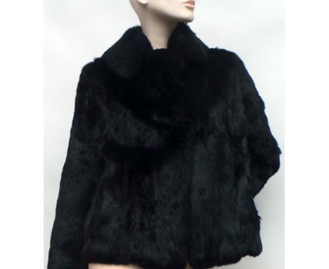 A vintage black coney fur jacket and a full length pale brown fur coat. Both good condition (2)