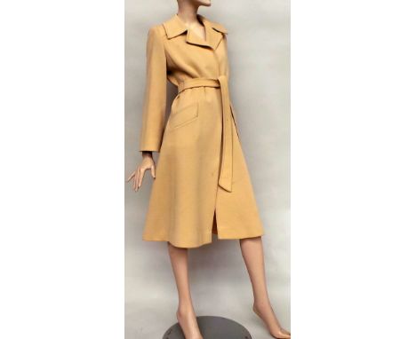 A vintage Aquascutum lined, beige pure wool coat with tie belt approx size 10. A Jasper Conran skirt suit in wool and lycra. 