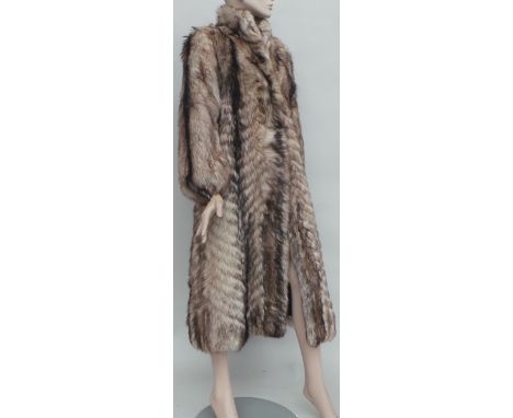 Ankle length vintage wolf fur coat - very good condition. Two side pockets and five hook fastenings down the length of the co