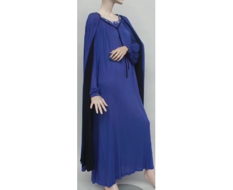 Three vintage 1970s/80s outfits. A 'Louis Feraud' purple rayon kaftan style dress with paste details to neckline with a match