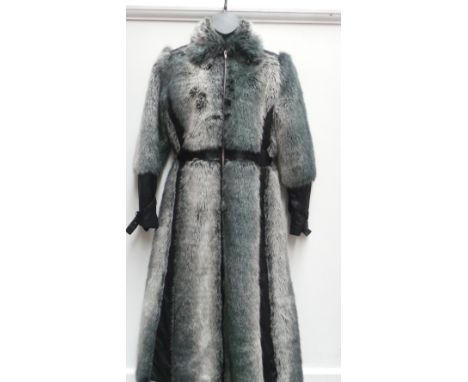 An unusual 70's/80's grey faux fur calf length fitted coat inset with leatherette panels at the waist and cuffs. Zips from to