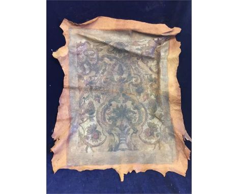 An Antique leather item with floral pattern 