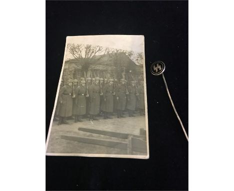 A Photo of WWII German soldiers and a copy of a SS stick pin.