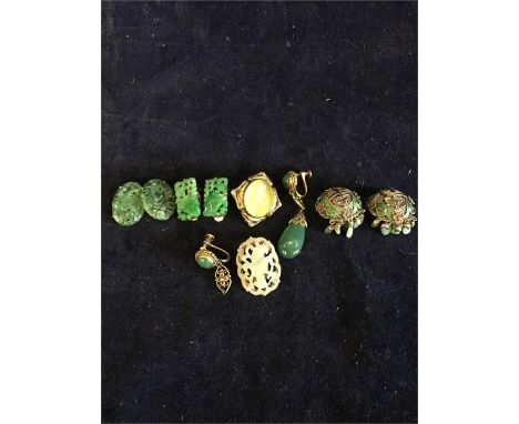 A selection of jade jewellery  on silver and yellow metal 