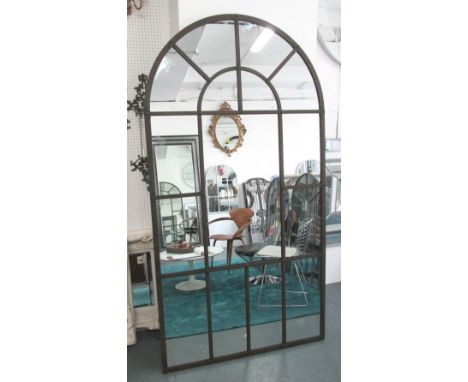 ARCHITECTURAL MIRROR, of large proportions with arched metal frame, 206cm x 109cm.