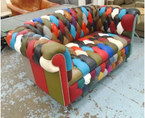 CHESTERFIELD STYLE SOFA, two seater, in harlequin leather and suede upholstery with chrome studded arms on short cabriole leg