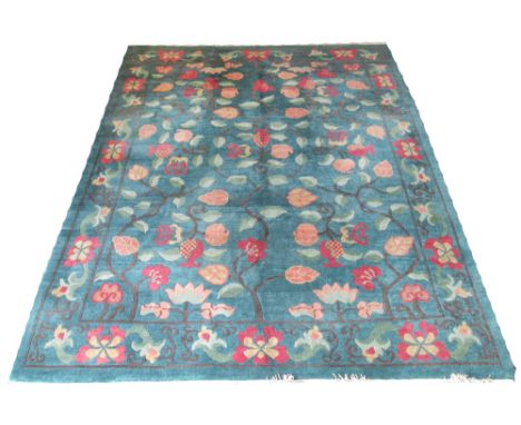 VOYSEY DESIGN CONTEMPORARY CARPET, 315cm x 245cm, all over pomegranite and vine design on a jade field.