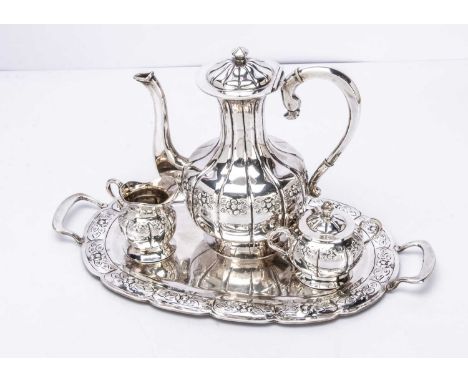 A c1970s Mexican coffee set by Sanborna, comprising coffee pot, covered sugar basin, milk jug and twin handled tray, 40.5cm w