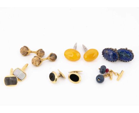 Six pairs of cufflinks, including a sapphire and ruby pair in gilt metal