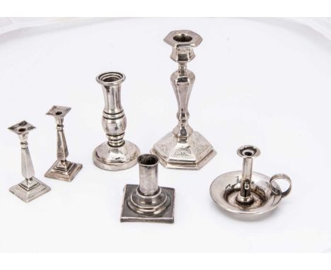 Six small candlesticks, including a pair of silver filled examples, 4.5cm, a miniature silver chamberstick, a taller unmarked