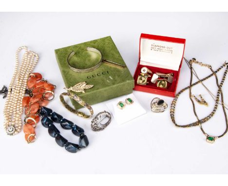 A good collection of costume jewels, including a Christian Dior necklace and earring set, simulating emerald and diamond, a G