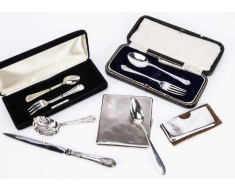 A small group of collectable silver items, including an Art Deco cigarette case, a toothpick, a tea caddy spoon, a card holde